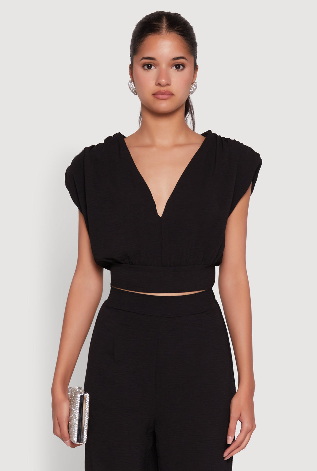 Chic Crepe Knit Blouse with Padded Shoulders and Tie Back